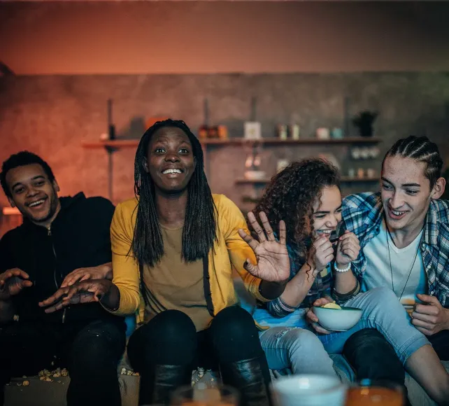 Fast channels hero image of young people watching TV