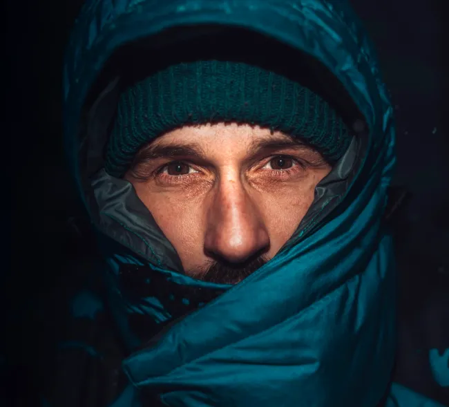 Exceptional Connectivity Portrait photo of a man in blue winter clothing