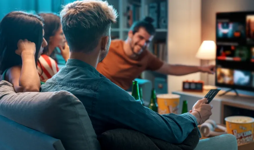 Friends watching TV - Hero banner
